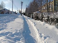 МАУ "Сансервис" после снегопада приводит тротуары Лысых Гор в порядок